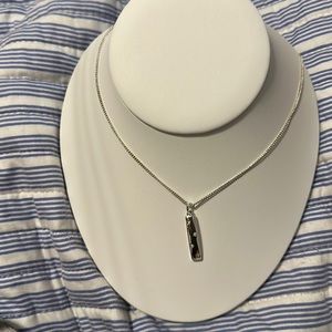 Set of a necklace and bracelet sliver with fake diamonds